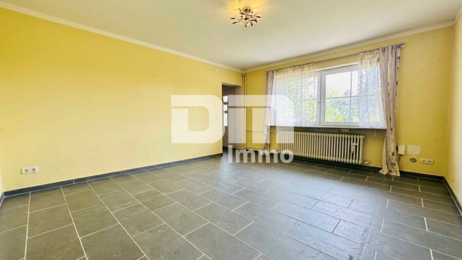 Umfangreich saniertes EFH inkl. PV-Anlage, Terrasse, Wintergarten und Garage - Souterrain Wohnzimmer